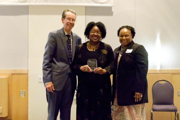 Drs. Benson and Harris present Dr. Joanne Gabbin with the Lifetime Achievement Award for her years of work with the Furious Flower Poetry Center and the Honors Program.